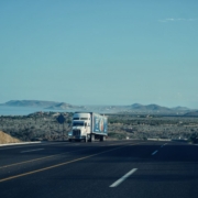 Semi Truck on Highway Semi truck driving on a highway, representing commercial trucking and fleet financing